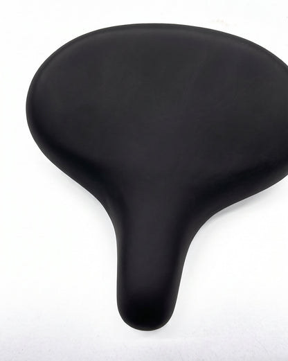 A black bicycle saddle with a smooth, matte finish, photographed from a top-down perspective on a white background.